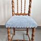 Chaise vintage en bois sculpté