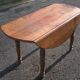 Oval flap table