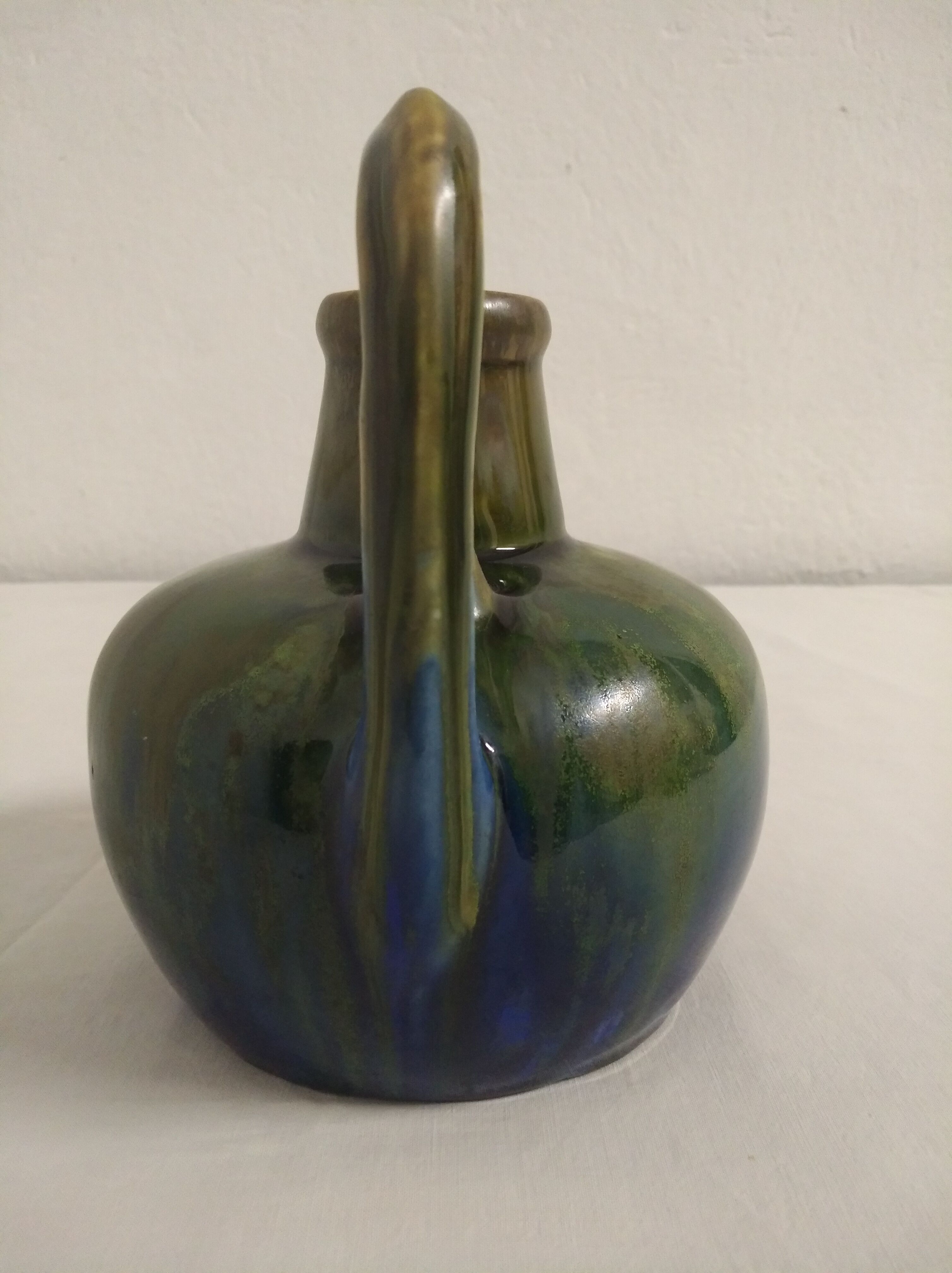 Flamed ceramic pitcher