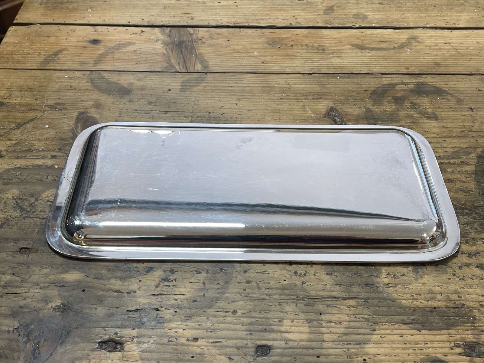 Small rectangular and beaded silver metal top