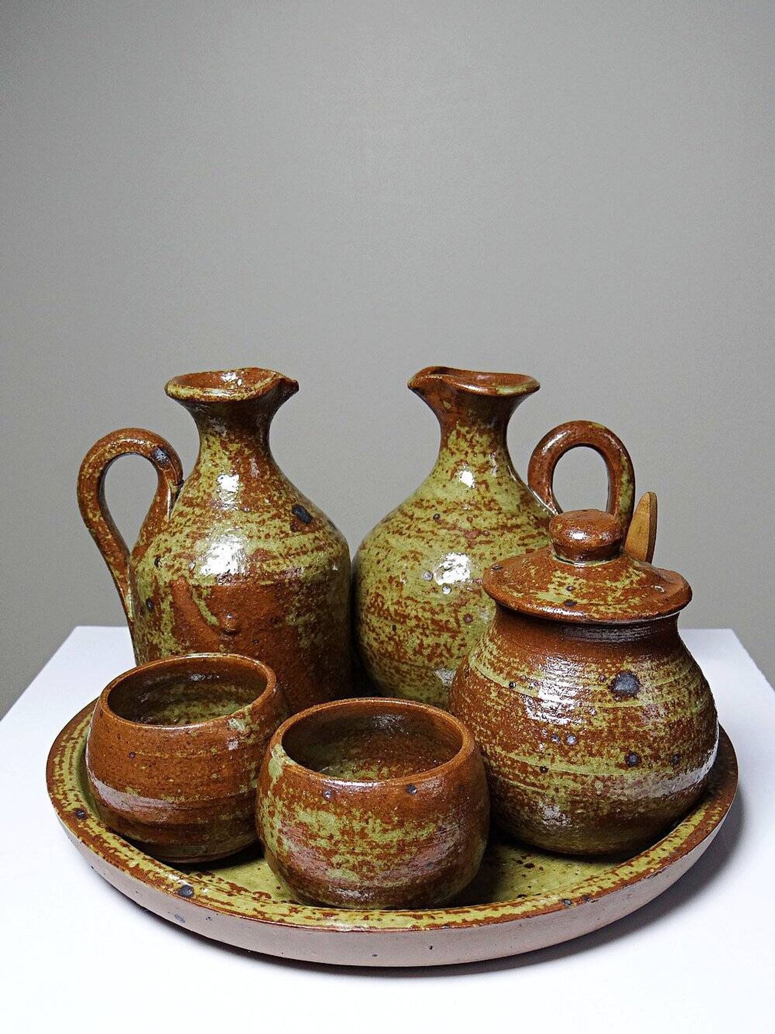 Vintage condiment service in glazed pyrite stoneware, artisanal Baudat La Borne style.