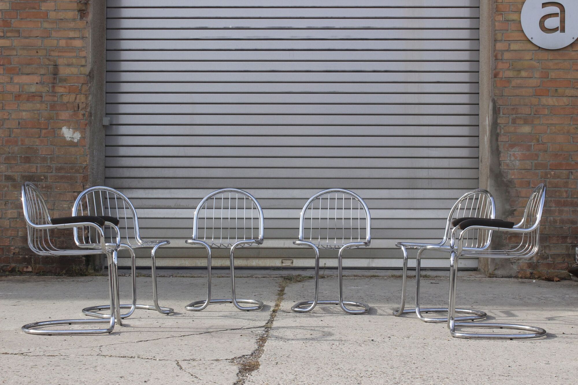 4 chairs & 2 armchairs in chrome-plated steel wire by Gastone Rinaldi, Italy 1970s