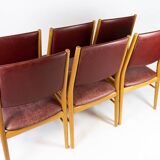 Suite of six chairs in oak and leather