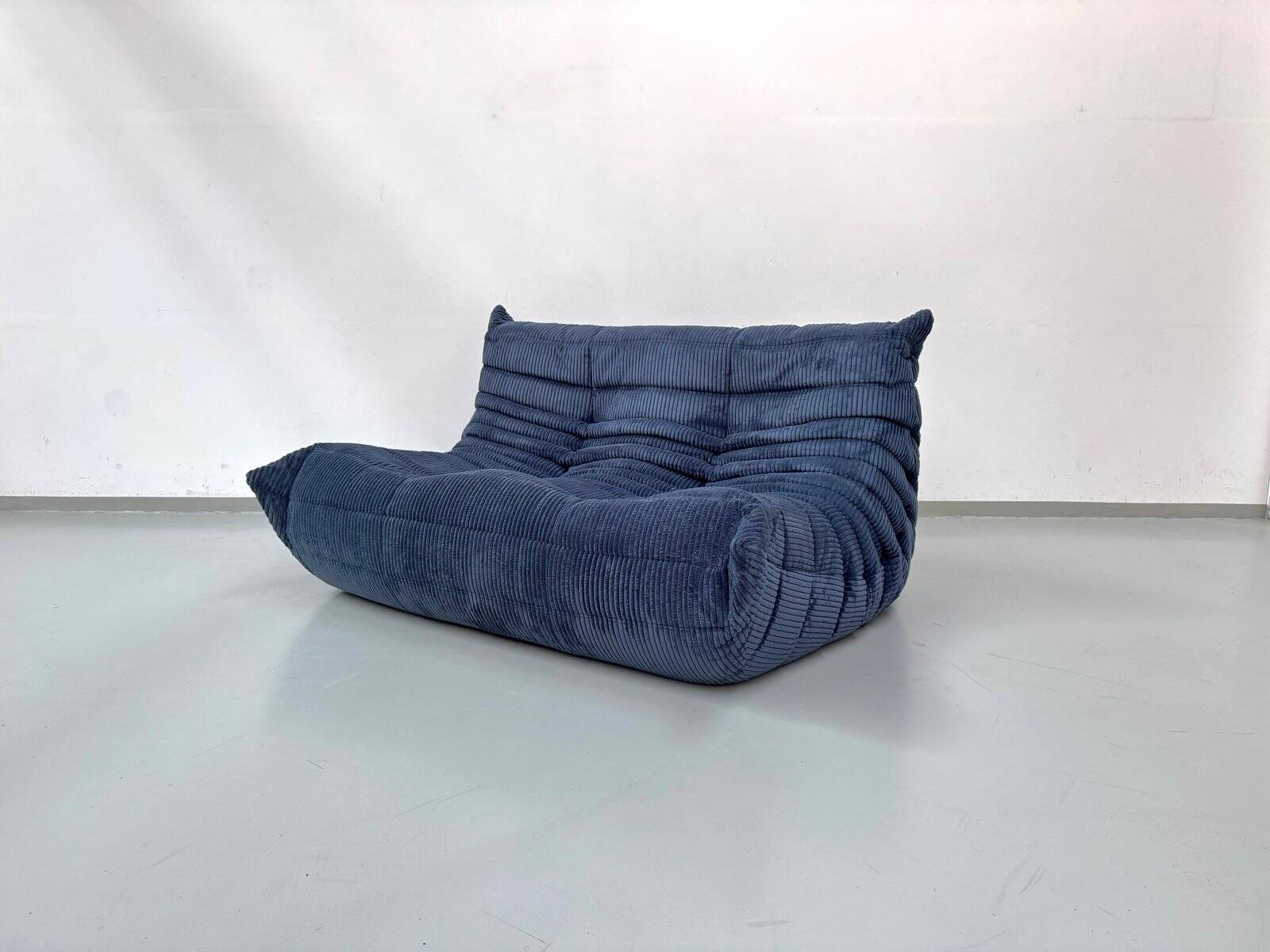 French Togo 2-seater sofa in blue corduroy attributed to Michel Ducaroy for Ligne Roset, 1970s