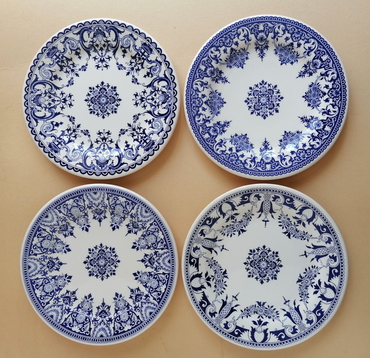 4 mismatched Gien dessert plates