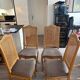 Four antique chairs in classic style with caning and upholstery.
