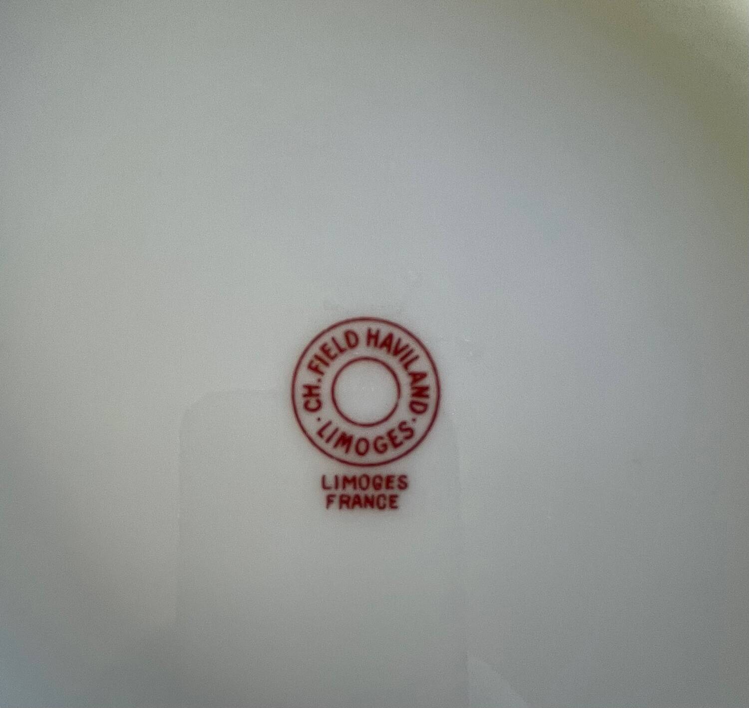8 Haviland Limoges dinner plates.