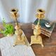 Duo de bougeoirs anciens en bronze