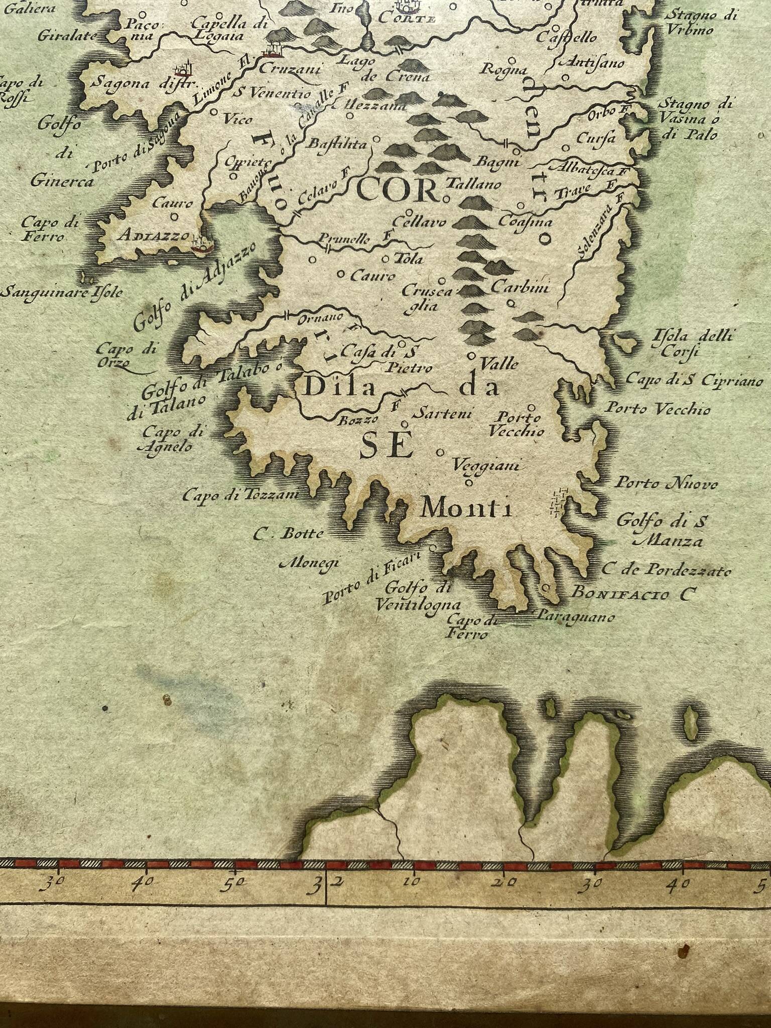 Old map of the Isle of Corsica framed under glass