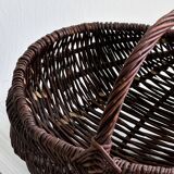 Dark wicker basket, mushroom basket.