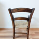 Vintage children's armchair in wood and straw, 50s