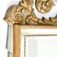 Miroir en bois laqué blanc et or à
