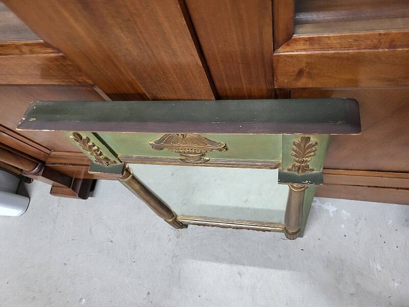 Empire style mirror in wood and gilding