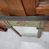 Empire style mirror in wood and gilding