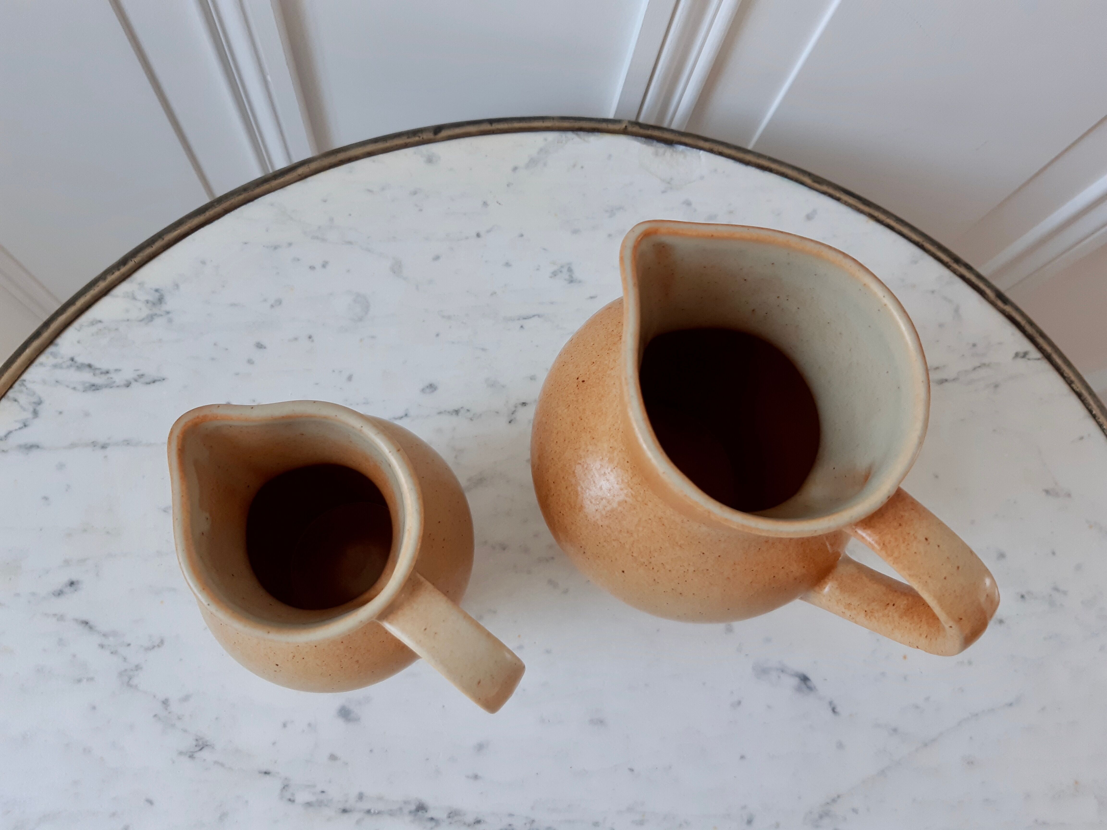 Duo of vintage sandstone pitchers Made In France