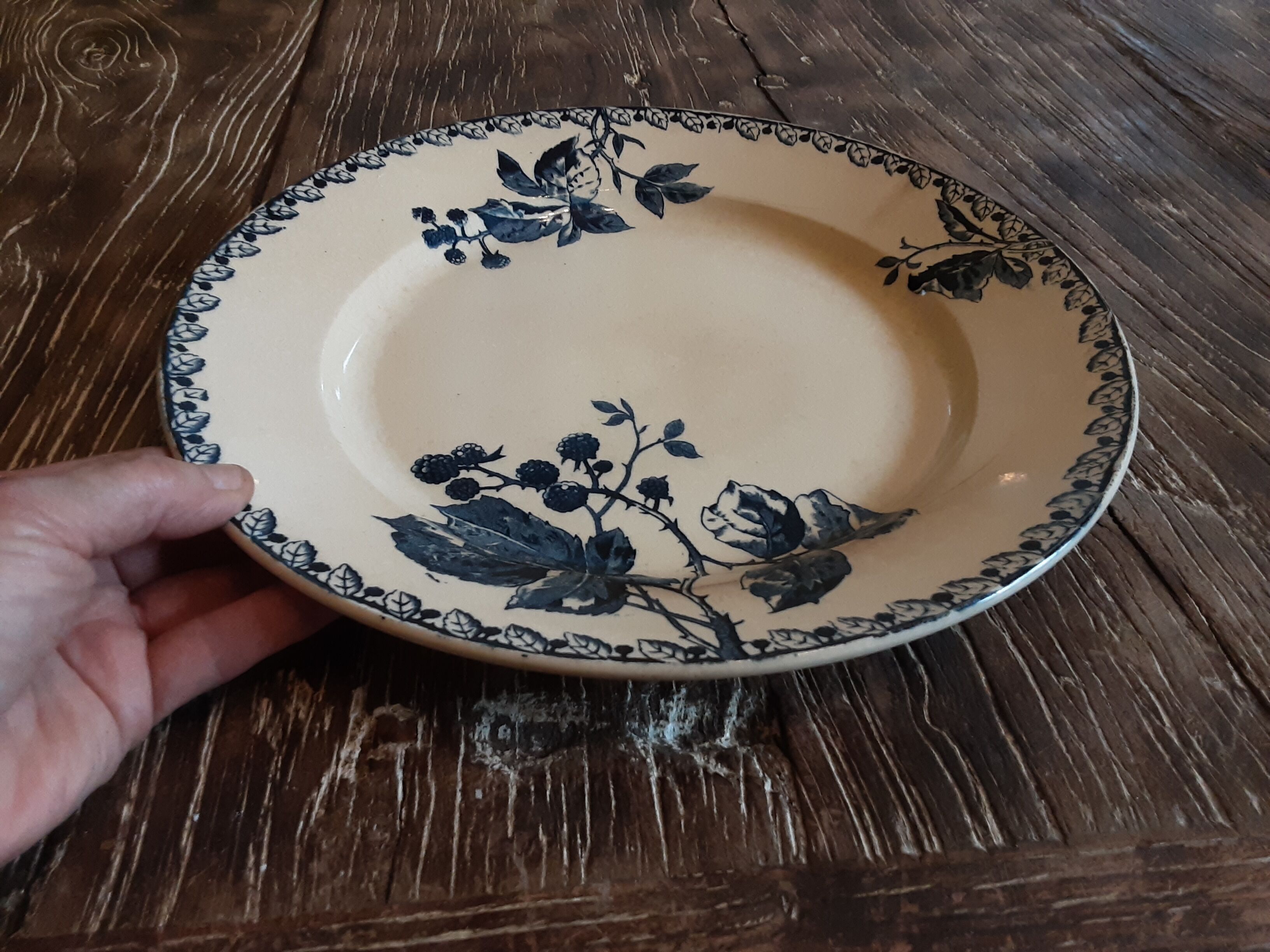 Ancient round iron earth dish