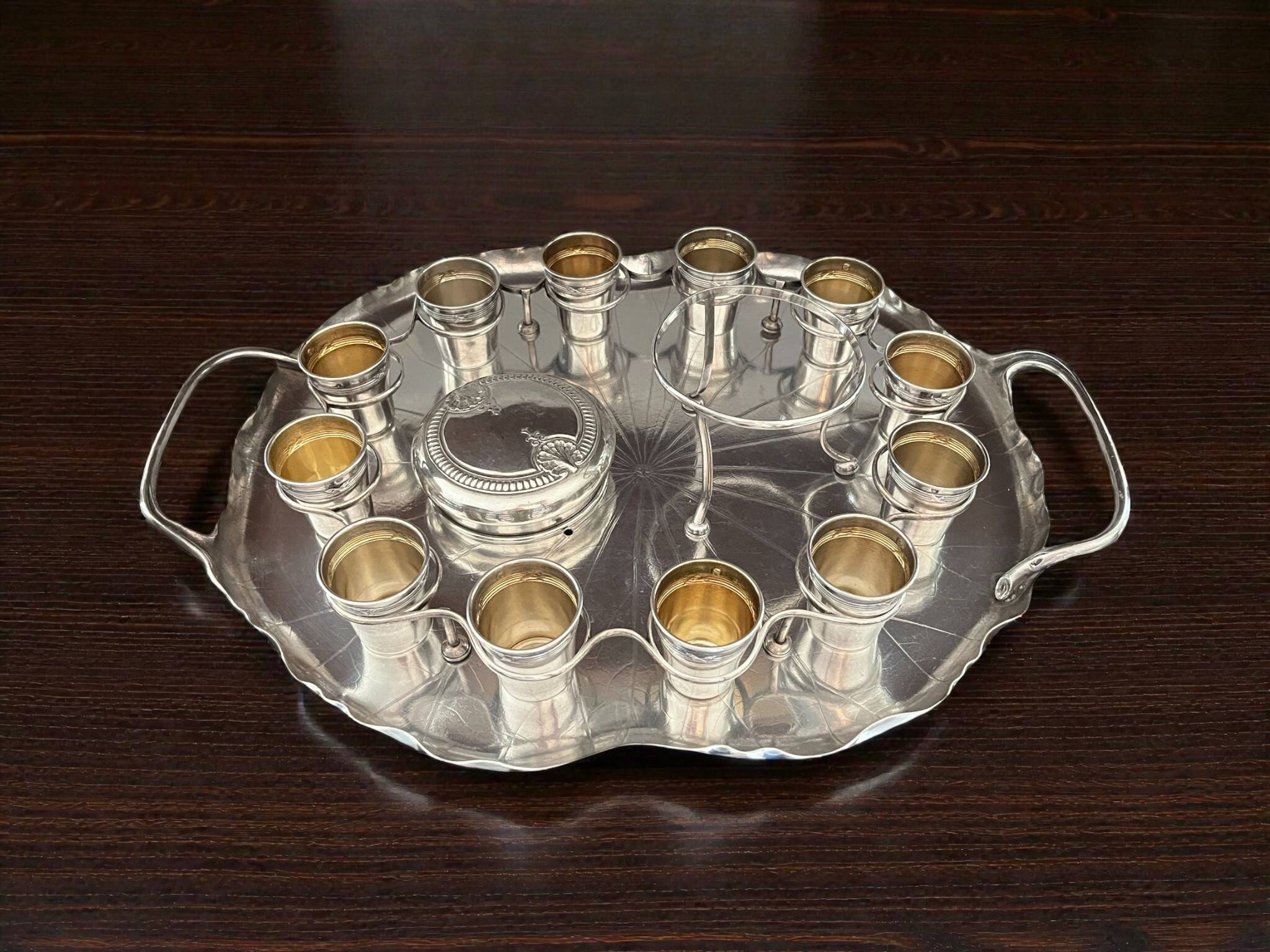 Silver-plated metal caviar service and 12 silver Minerva goblets, circa 1900