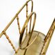 Rare Mid Century Modern magazine rack made of solid brass and genuine bambo
