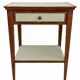 Small vintage table in sage green wood.