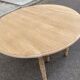 Round dining table with extendable leaves, Louis Philippe style, stripped in raw oak.