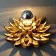 Applique forme fleur, en bois sculpté doré et verre, années 70