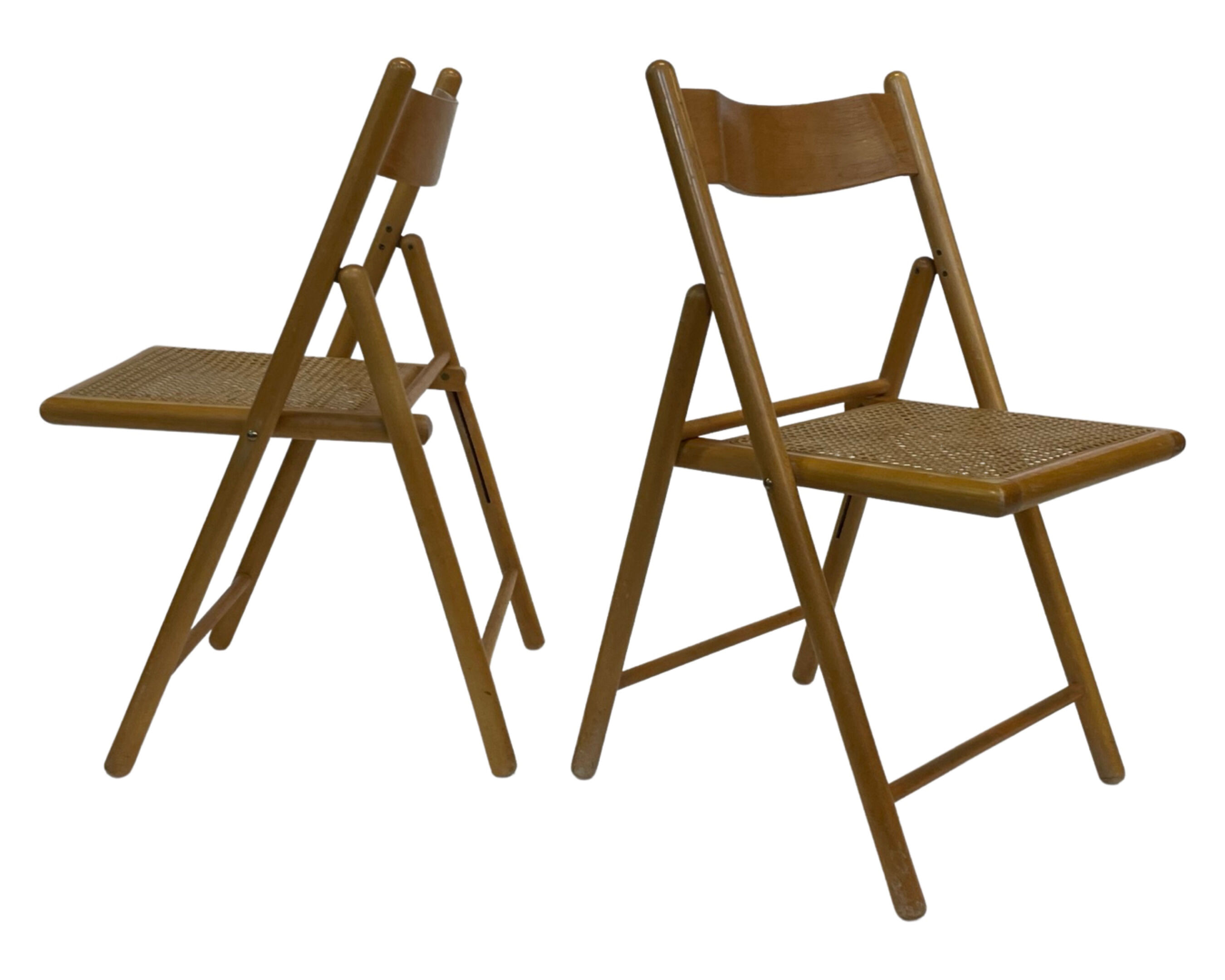 Set of four vintage folding chairs with webbing and wood 1970s