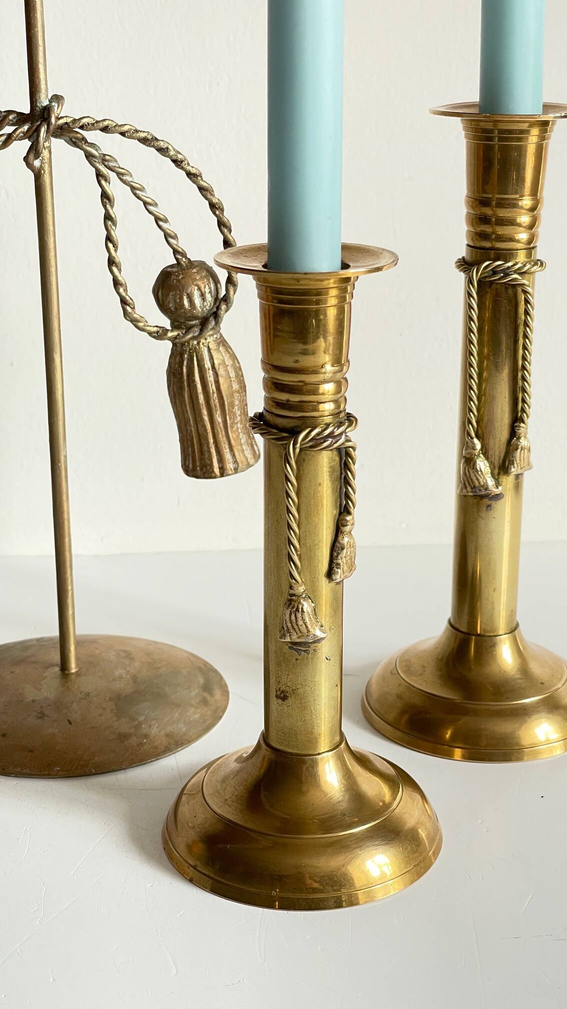 Trio of vintage knotted candlesticks brass
