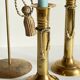 Trio of vintage knotted candlesticks brass