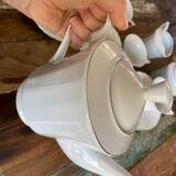 Coffee service for 6 cups, coffee pot, sugar bowl, and milk jug.