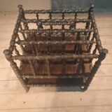 Rosewood magazine rack on casters