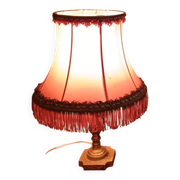 Vintage lamp, pink fringed pagoda shade and brass base.