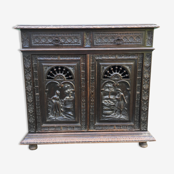 Breton buffet with characters carved in solid oak with 2 doors and 2 drawers