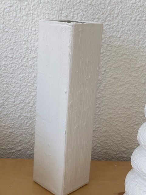 Trio of white vases