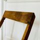Two vintage wooden folding chairs, circa 1960