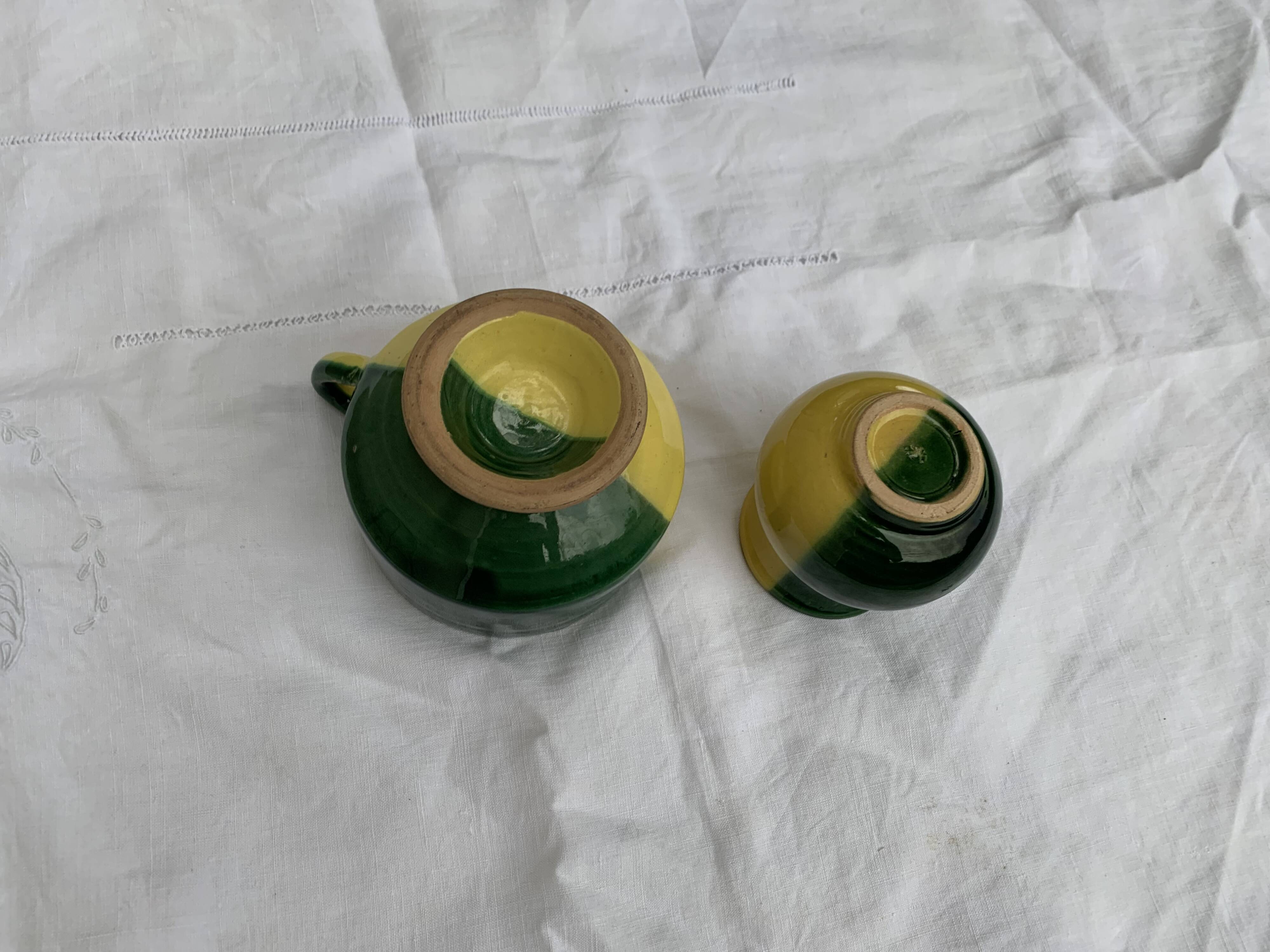 Enameled ceramic bowl and milk jug, two-tone yellow and green, vintage 1950