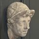 Antique plaster sculpture of a female face from the early 20th century