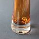Two vintage Scandinavian double-layered amber blown glass candlesticks