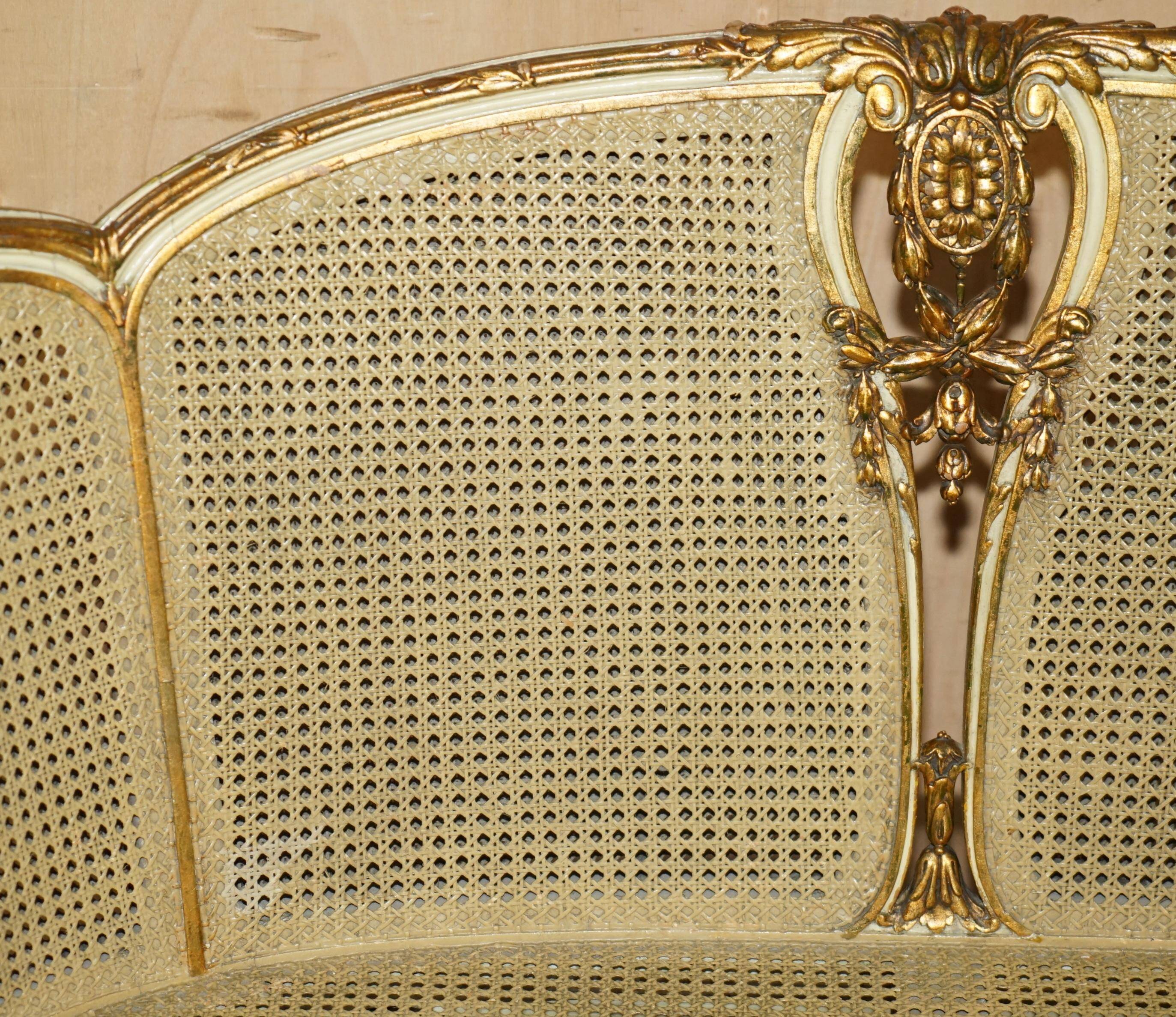 Louis XVI Bergère canapé in gilded wood with double caning