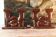 Pair of Art Deco carved wood candlesticks, signed Delaporte