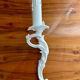 Louis XVI style bronze wall light with white patina