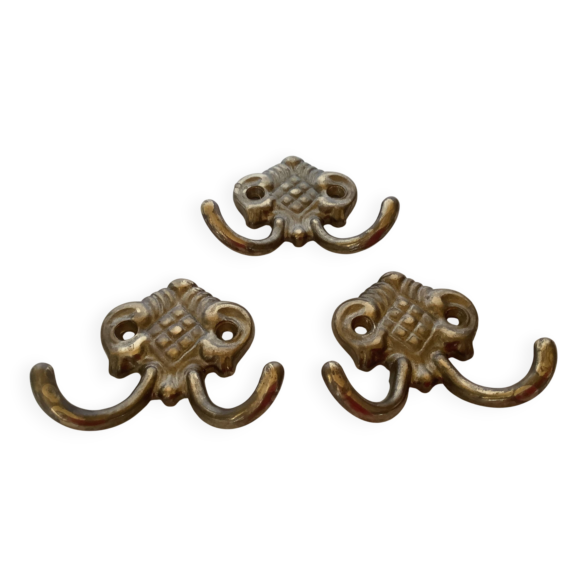 Three double brass coat hooks.