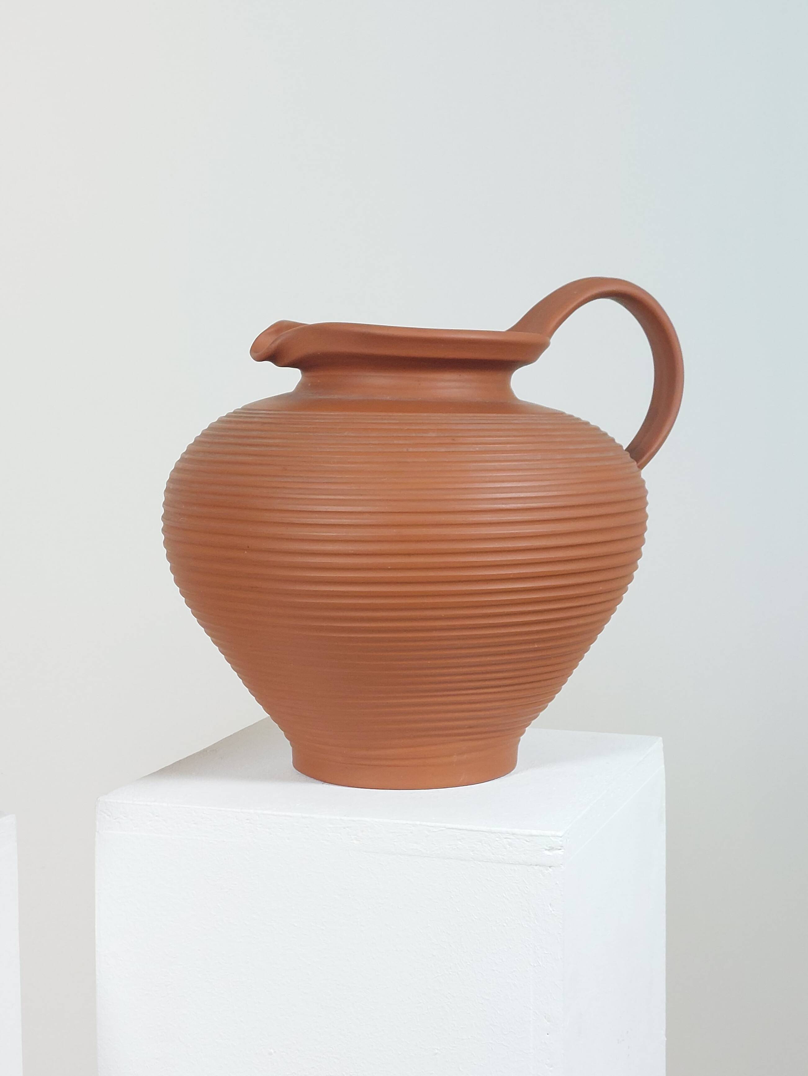 Pair of handcrafted terracotta vases from the mid-century.