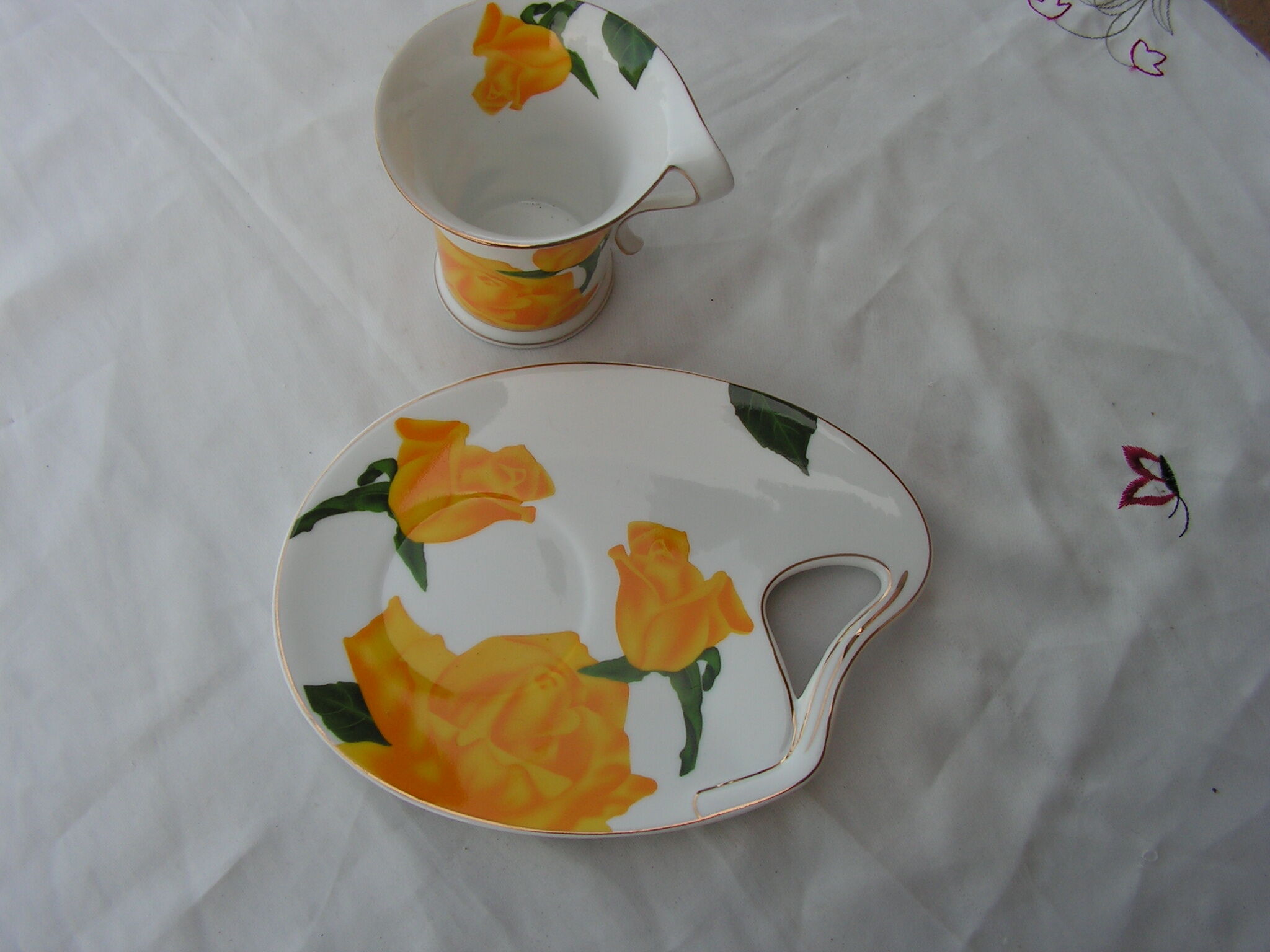 So french design porcelain cup and under cup