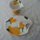 So french design porcelain cup and under cup