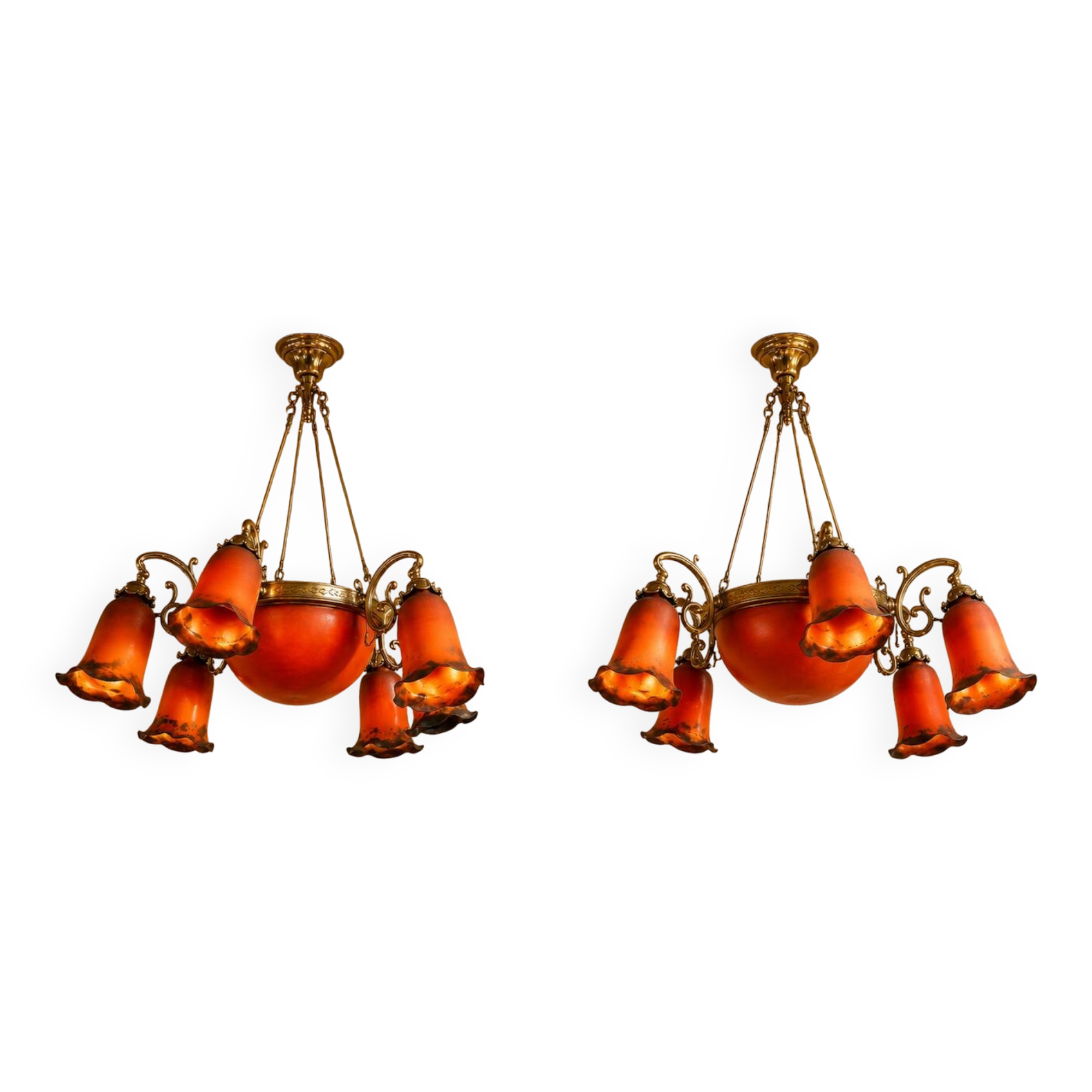 Pair of Art Nouveau style chandeliers in bronze and orange glass paste.