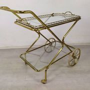 Vintage golden brass rolling service