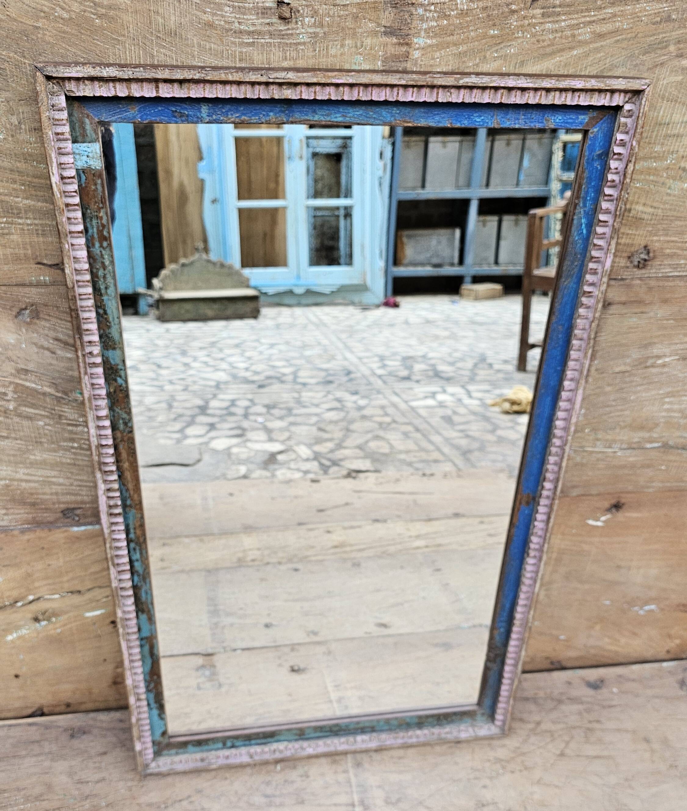 Old art deco mirror in burmese teak