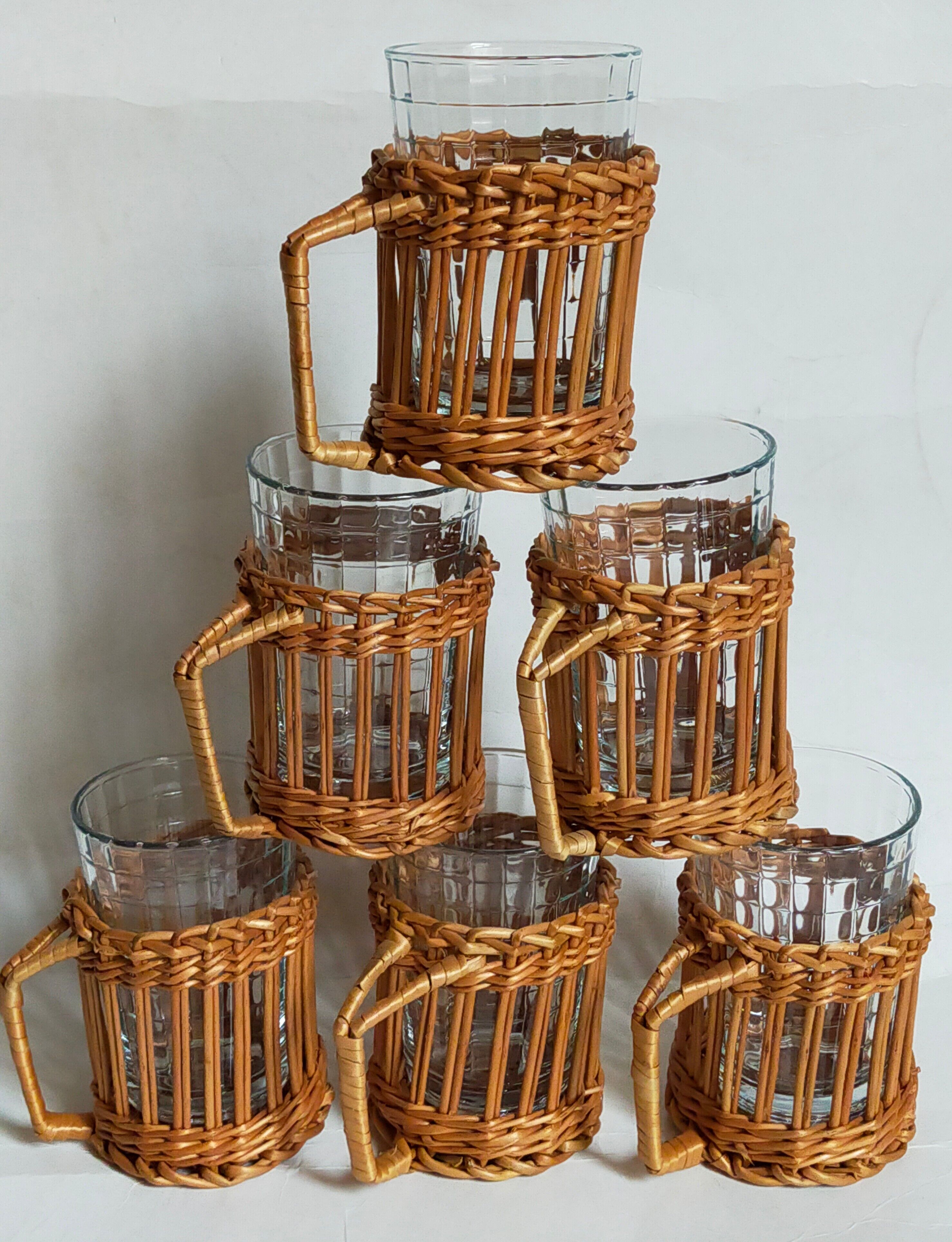 Six vintage 50s glasses in braided rattan cases