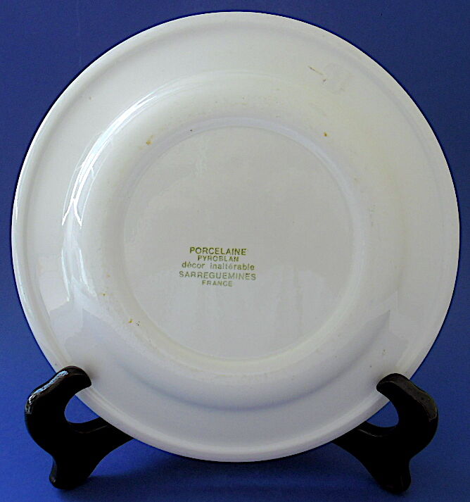 Suite of twelve (12) hotel-grade porcelain table plates