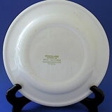 Suite of twelve (12) hotel-grade porcelain table plates